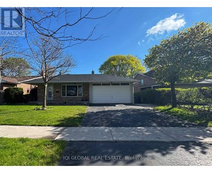A house with a garage is for sale by IQI Global Real Estate Brokerage.
