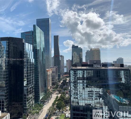 A cityscape with tall buildings and a BB&T sign on one of them.
