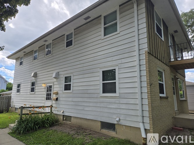 A house with a sign that says "available" in front of it.