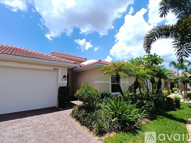 A house with a driveway and a garage door.