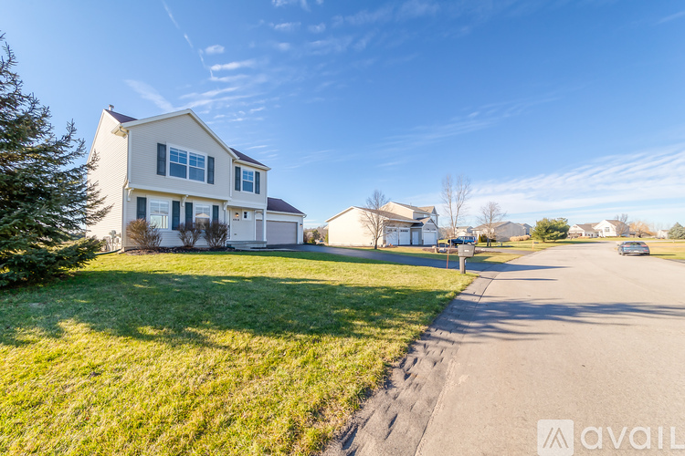 A house with a lawn in front of it is for sale.