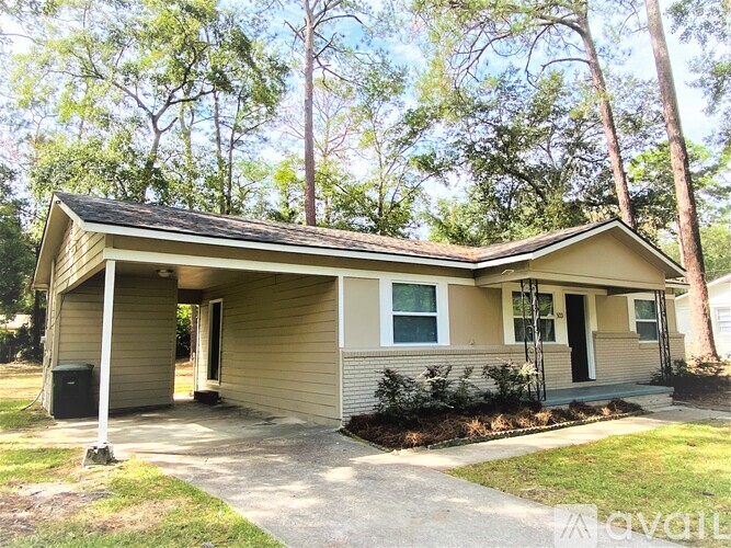 A small house with a porch and a covered entrance.