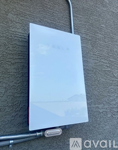 A white Samsung box is attached to a wall.
