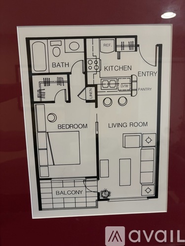 A floor plan of a living space with a kitchen, bathroom, and bedroom.