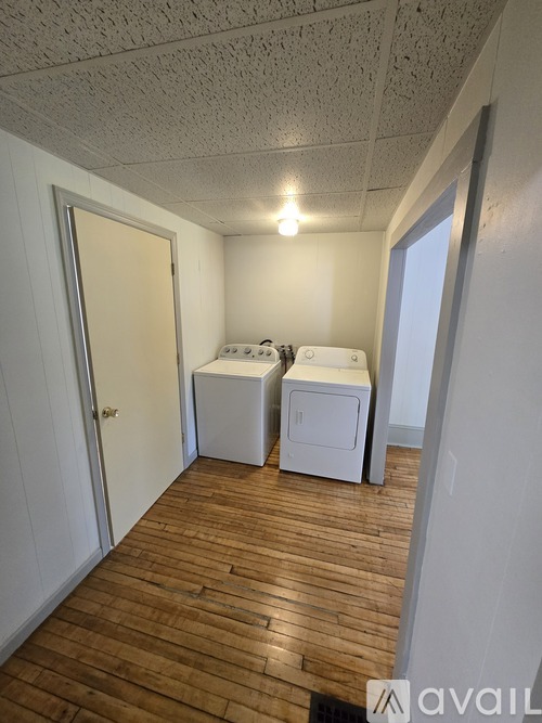 A laundry room with a washer and dryer.