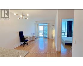 A room with a desk and a chair is shown.