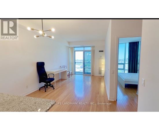 A room with a desk and a chair is shown.
