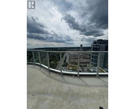 A view from a high-rise building looking down at a cityscape.