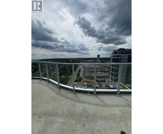 A view from a high-rise building looking down at a cityscape.