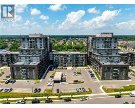 A realtor logo is visible on the top left corner of the image.