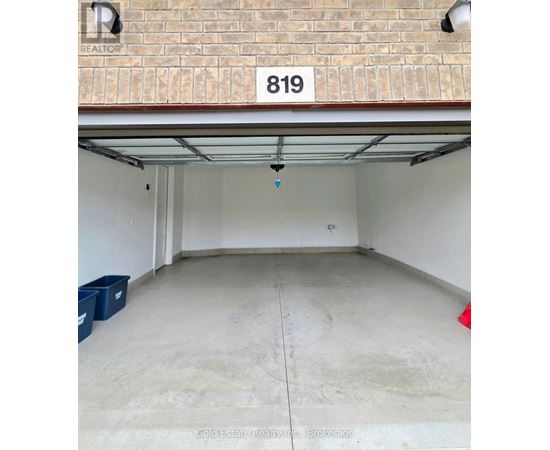 A garage with the number 819 on the wall.