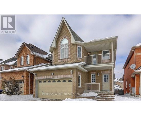 A house with a garage is for sale in the winter.