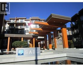 A building with a sign that says "SAIL" in front of it.