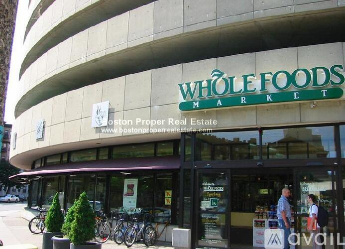 A Whole Foods Market storefront with a website listed below it.