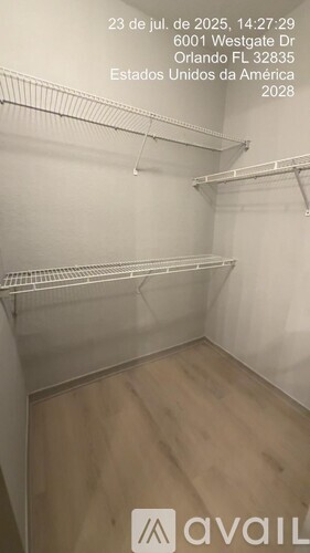 Empty room with a sign that says "available" on the wall.