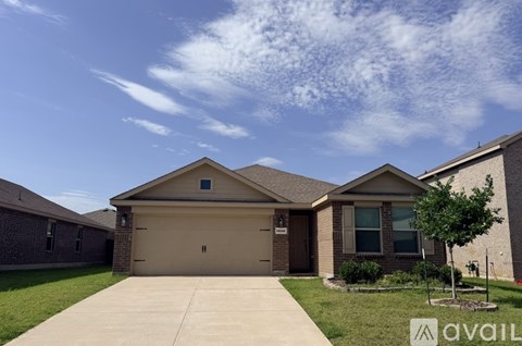 A house with a garage is available for rent.