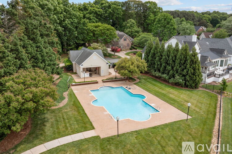 A house with a pool in the backyard.