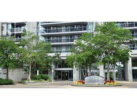 A large building with a sign that says "ULTIMA CONVENIENCIES" in front of it.