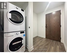 A washer and dryer in a small room.