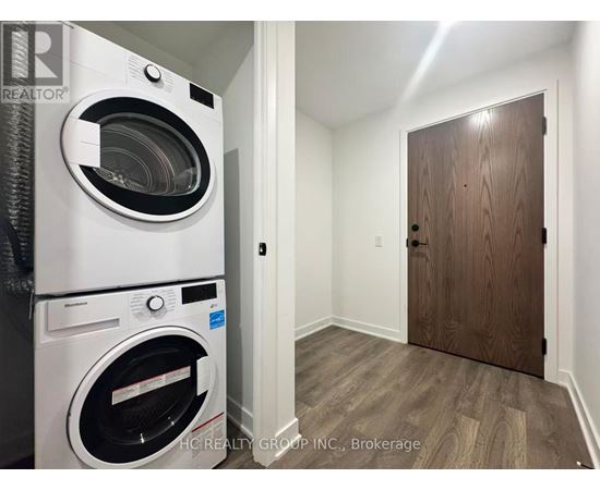 A washer and dryer in a small room.