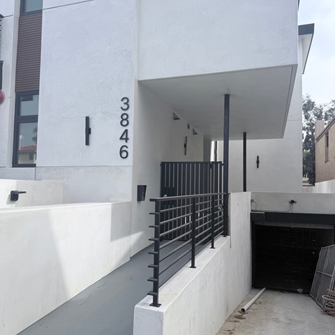 A white building with the number 3846 on it.