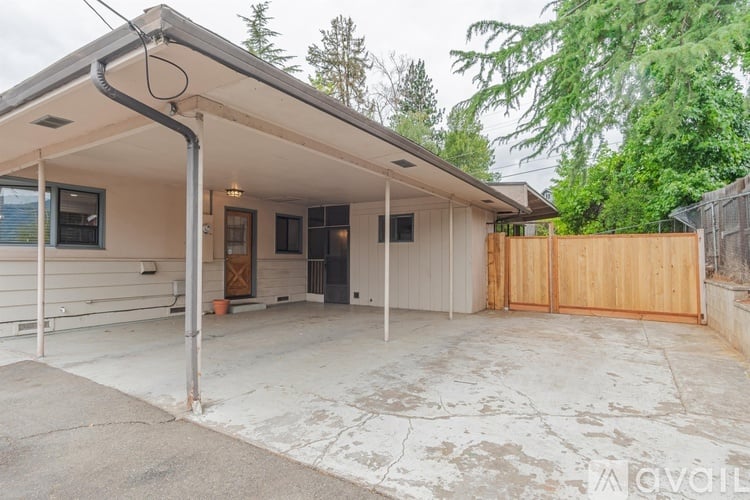 A house with a garage and a driveway.