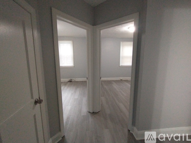 A room with a door and a window.