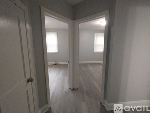 A room with a door and a window.