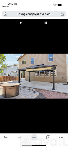 A house with a covered patio area is shown in the image.