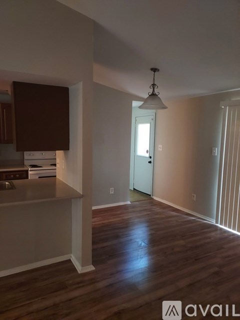 A kitchen with a counter and a cabinet.