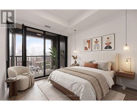 A bedroom with a large bed, a chair, and a balcony with a view of the city.
