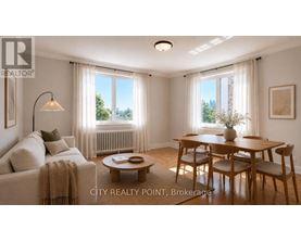 A well-lit living room with a couch, coffee table, and dining table.
