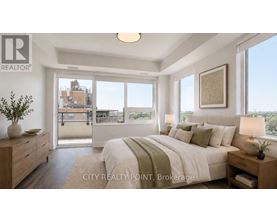 A bedroom with a large bed and a view of the city.