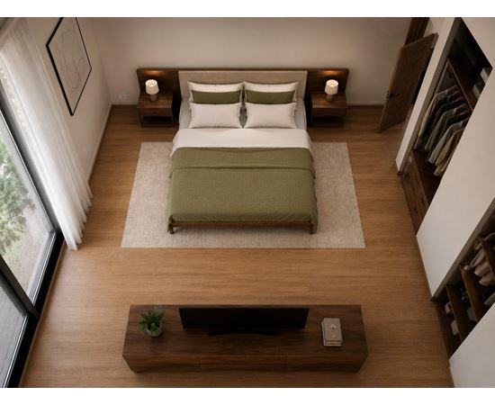 A bedroom with a bed, nightstands, and a window.
