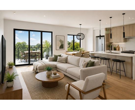 A modern living room with a large white sofa, a wooden coffee table, and a flat-screen TV.