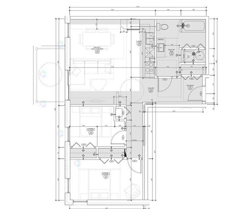 A detailed architectural floor plan of a building with labeled rooms and measurements.