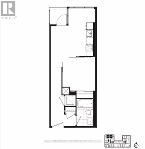 A black and white floor plan of a building with a REALTOR logo in the upper left corner.