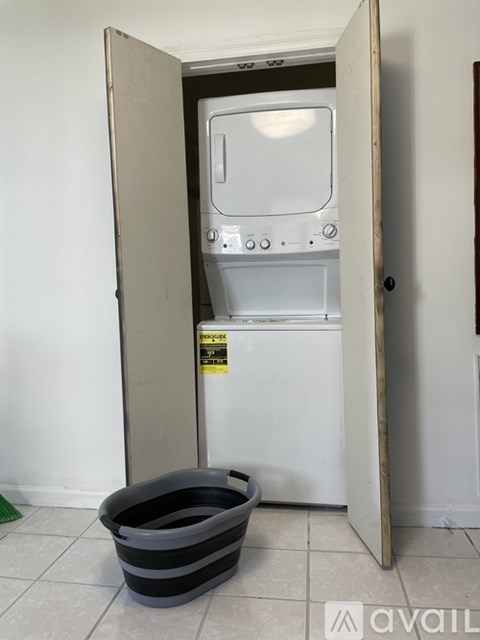 A white oven is installed in a kitchen.