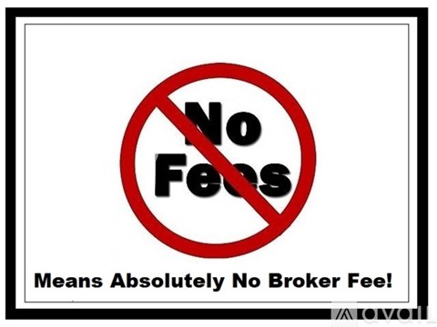 A sign with a red circle and slash over the word "No Fee" and a statement below that means absolutely no broker fee.