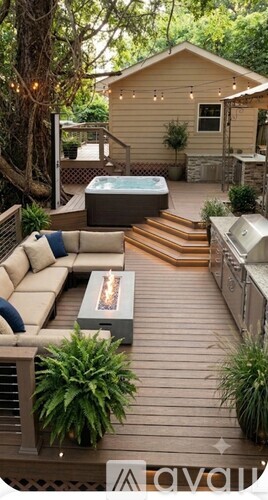 A hot tub is on a deck with a couch and plants.