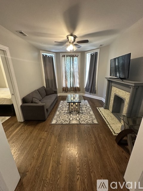 6527 S Vernon Ave 4 Beds Apartment for Rent