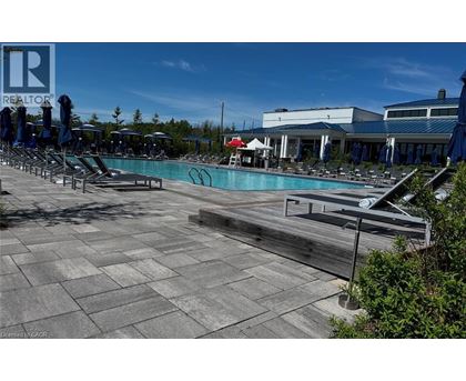 A pool area with a sign that says REALTOR.