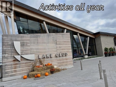 A sign that says Lake Club in front of a building.