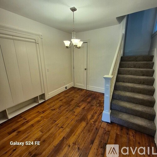 A floor plan of a three-bedroom apartment with dimensions and closet locations.