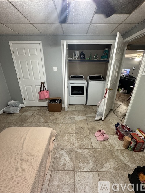 A kitchen with a white refrigerator and a white oven.