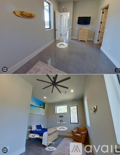A living room with a television and a bedroom with a bed and a dresser.