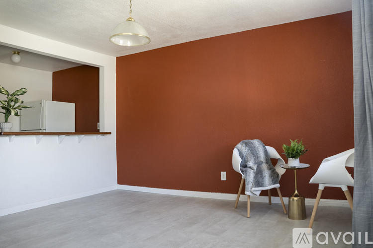 A room with brown walls and a white floor.