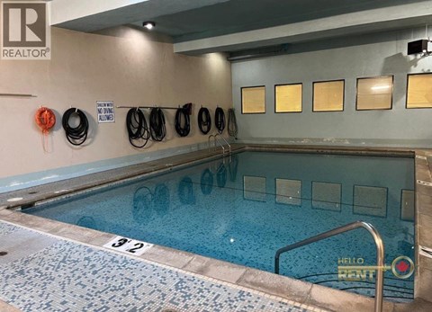 A pool with the number 32 on the floor.