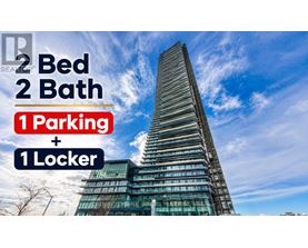 A tall building with a blue sky in the background and text indicating it has 2 bedrooms, 2 bathrooms, 1 parking space, and 1 locker.
