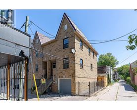 A brick building with a sign that says Chestnut Park Real Estate.